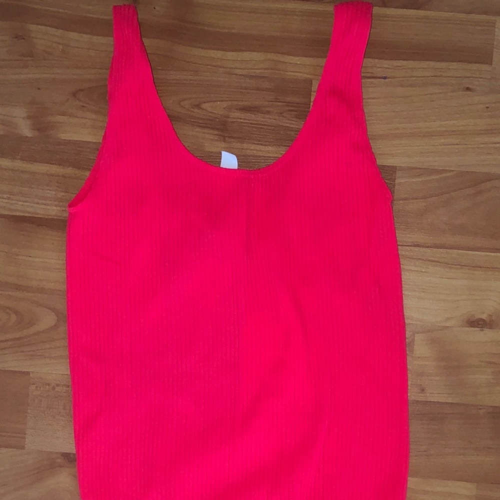 neon pink body suit